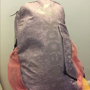 Purple and pink Reebok backpack